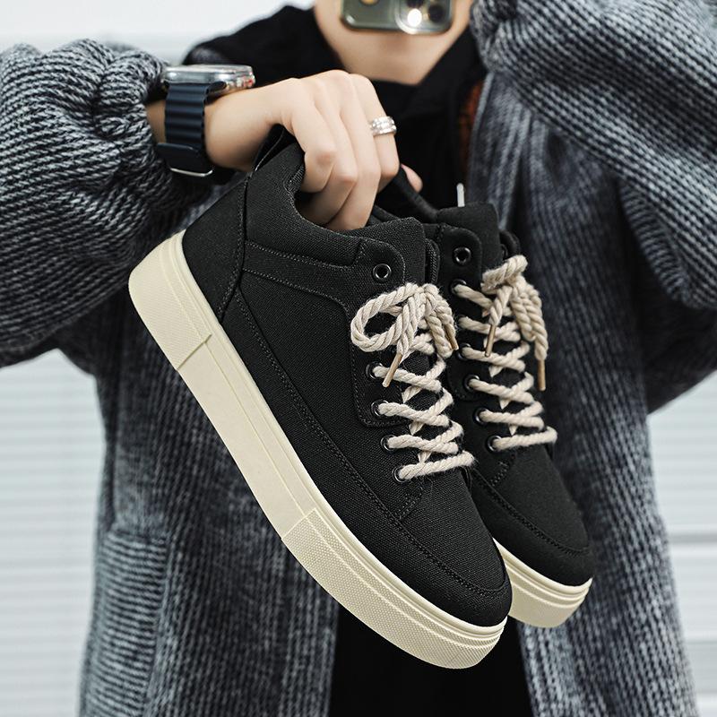 

Thick sole height increase 2025 spring fashion mid-top canvas shoes men s black dirt-resistant simple and comfortable casual board shoes 39