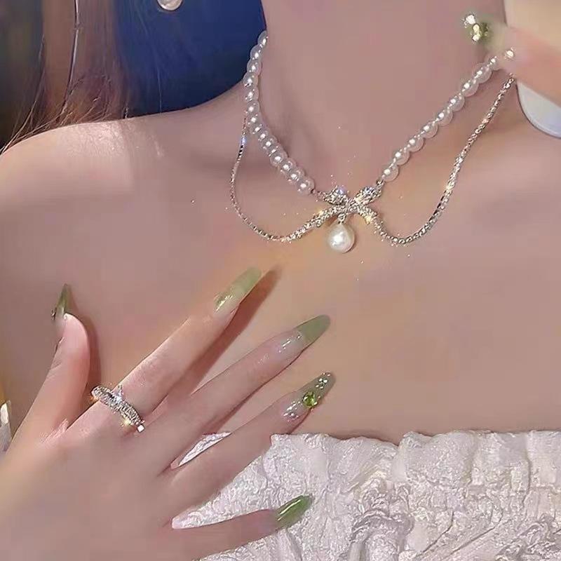 Vintage flash diamond bow pearl necklace female design sense cold wind choker neck chain collarbone chain female