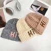 Letter knitted hat women's autumn and winter big head circumference thickened warm ear protection cold hat student outdoor versatile wool hat