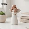 Heartwarming Pet Keepsake Angel Holding Puppy Figurine, Cute Dog Resin Statue for Home Decorative Accents Entrance Desk Decor, Handcrafted Wood