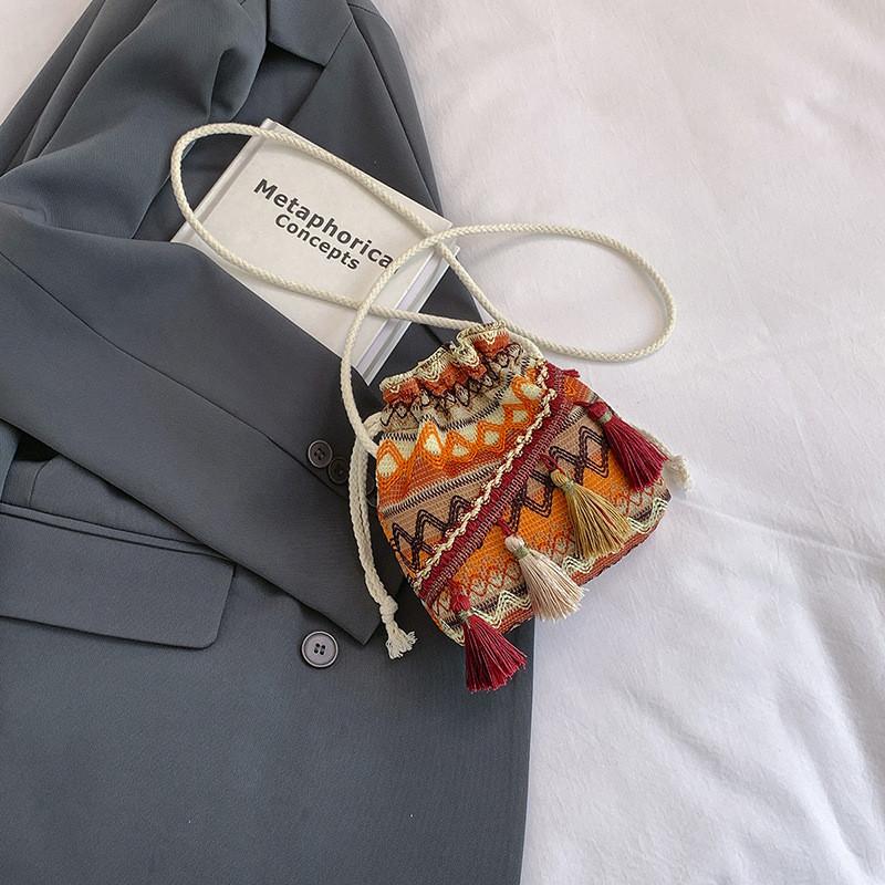 Trendy Stylish Woven Bucket Bag For Women In Vibrant Blue Orange And Red Perfect For Street Fashion