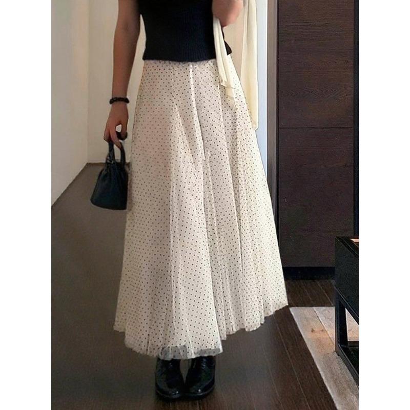 

Korean version of small polka dot high-waisted mesh skirt women s spring and summer new temperament a word vertical pendulum medium and long skirt One size fits all