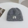 Simple Letter Pattern Labeling Knitted Hat for Women In Autumn and Winter New Thickened Warm and Cold Hat Showing Face Small Ear Protection Hat