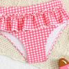 Mergaitei dviejų dalių bikini maudymosi kostiumų komplektas su banguotu krašteliu viršutine dalimi ir sijonėliu apačioje, reguliuojamomis petnešėlėmis, lengvas, greitai džiūstantis maudymosi kostiumas vaikams