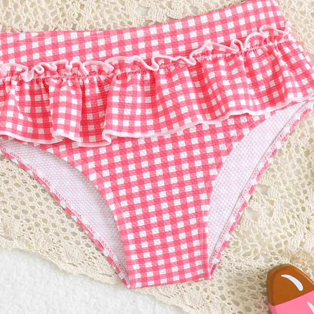 Mergaitei dviejų dalių bikini maudymosi kostiumų komplektas su banguotu krašteliu viršutine dalimi ir sijonėliu apačioje, reguliuojamomis petnešėlėmis, lengvas, greitai džiūstantis maudymosi kostiumas vaikams