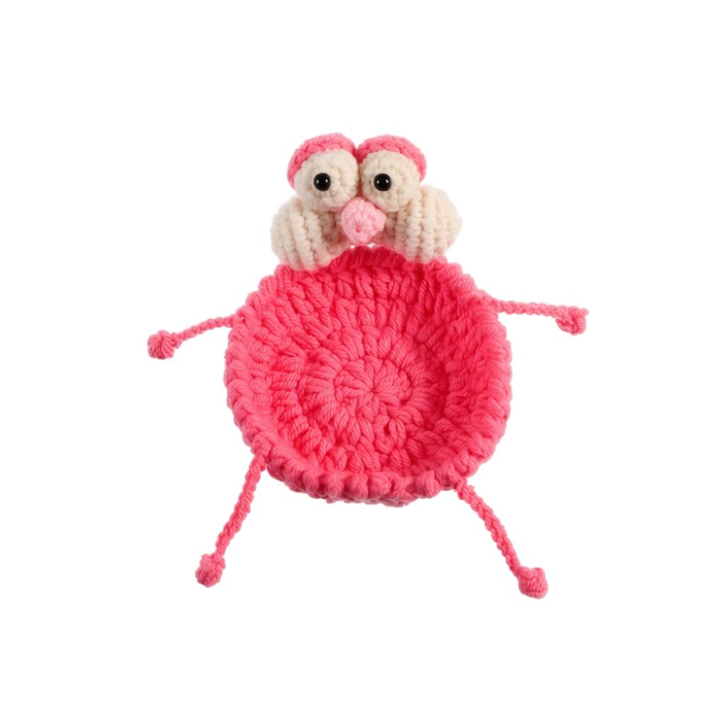 Handmade Crochet Cartoon Style Round Coaster with Four Extended Legs and Decorative Eyes and Nose Detail for Table Protection and Home Use
