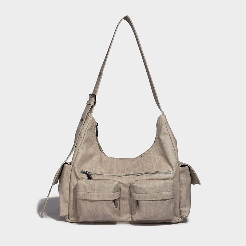 

Trendy large-capacity handheld locomotive, multi-pocket design, fashionable single shoulder underarm tooling tote bag хакі