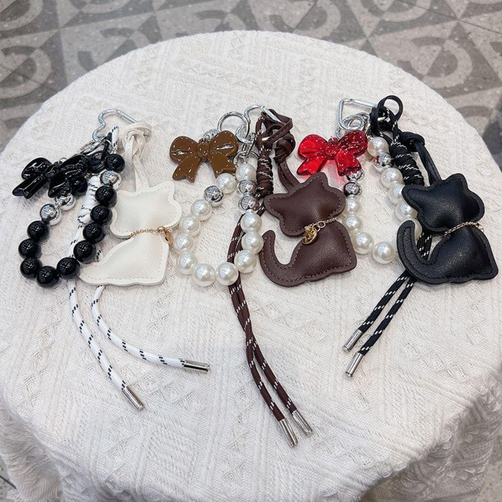 INS Pearl String Leather Cat Pendant Cartoon Cute Key Ring Bowknot Creative Bag Hanging Charms Backpack Charms