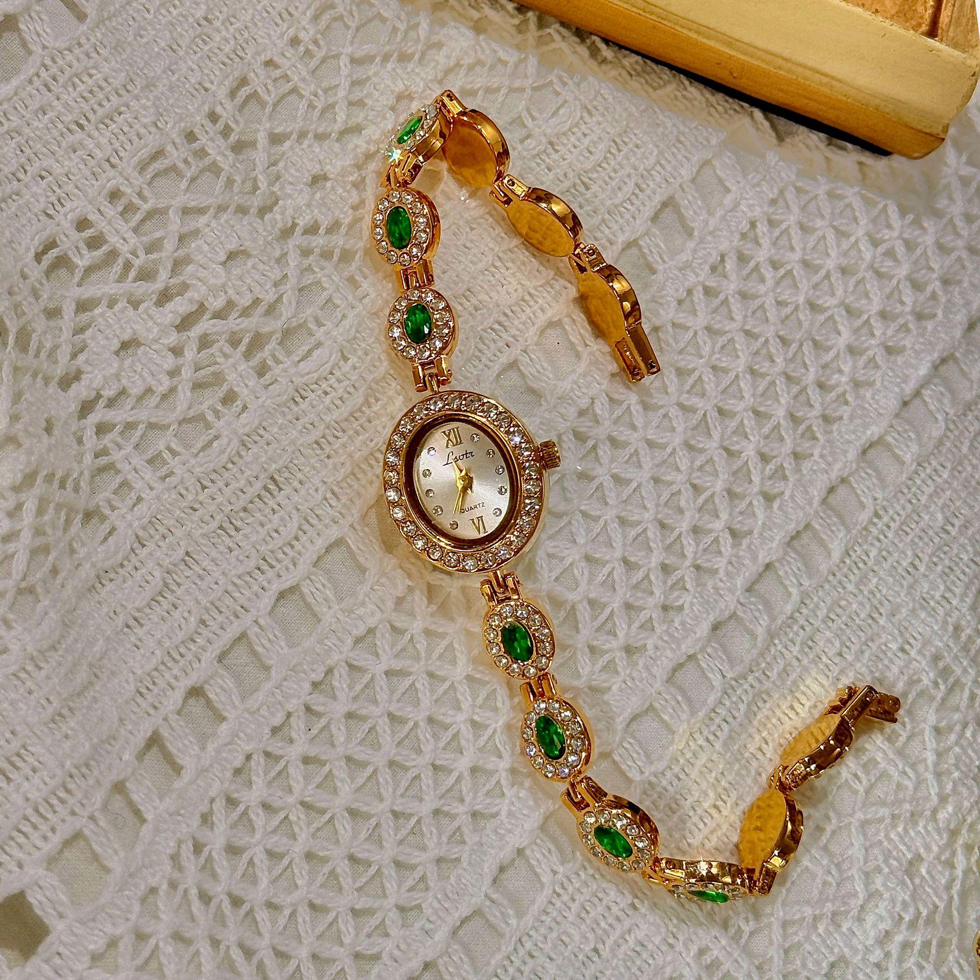 

LSVTR Женские винтажные модные овальные часы класса люкс с радужным светом и красным и зеленым драгоценным камнем зелёный