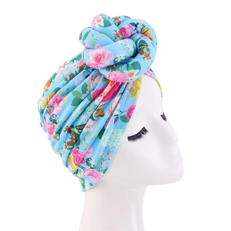 

Африканский тюрбан с принтом для женщин Новая мода Готовые тюрбаны с узлом сверху Цветочный эластичный хиджаб Дамский головной убор для вечеринки или свадьбы