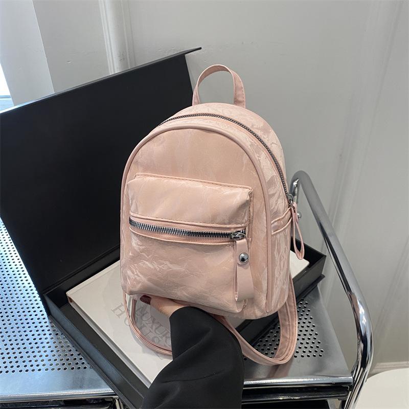 

Студенческий классный рюкзак для колледжа женский 2025 новый мини маленький рюкзак универсальный для поездок на работу и путешествий розовый