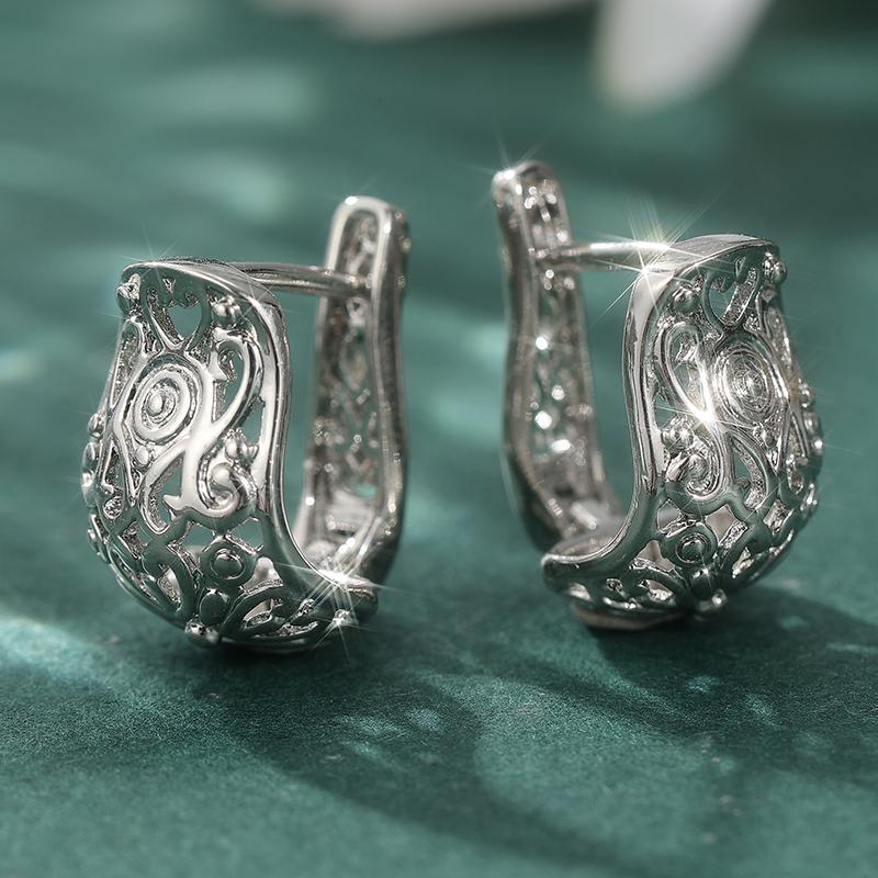 Exquisite gold-silber plattierte handgeschnitzte hohle Creolen für Damen Elegante Hochzeits-Verlobungs-Schmuck-Accessoires Handwerkskunst