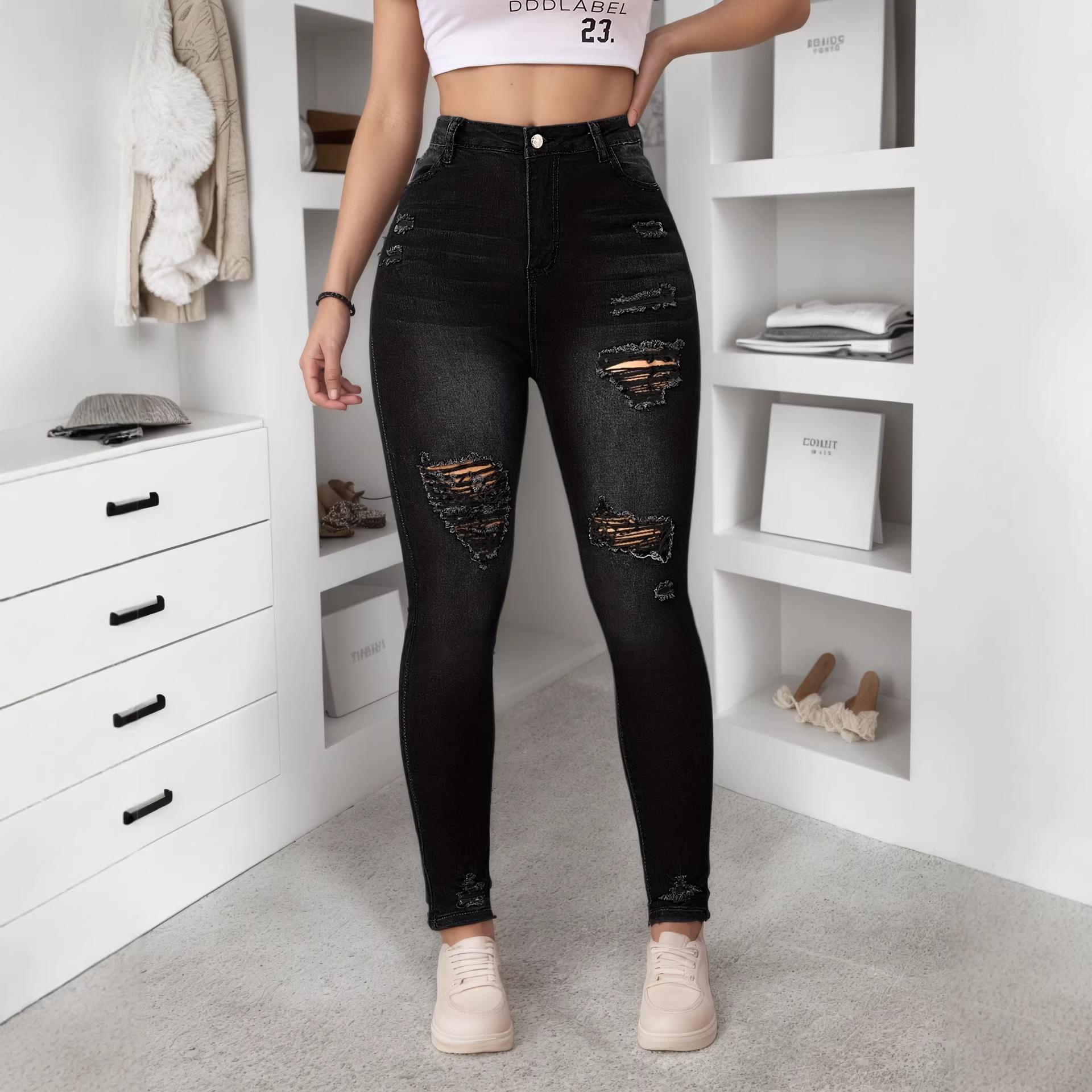 High-street fashion: unique black ripped women’s stretch slim-fit skinny jeans – the latest trend XS чёрный