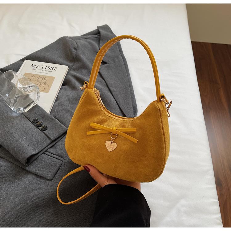 

Fashion commuter handbag women 2025 new retro bow dumpling bag niche design messenger bag tide коричневый