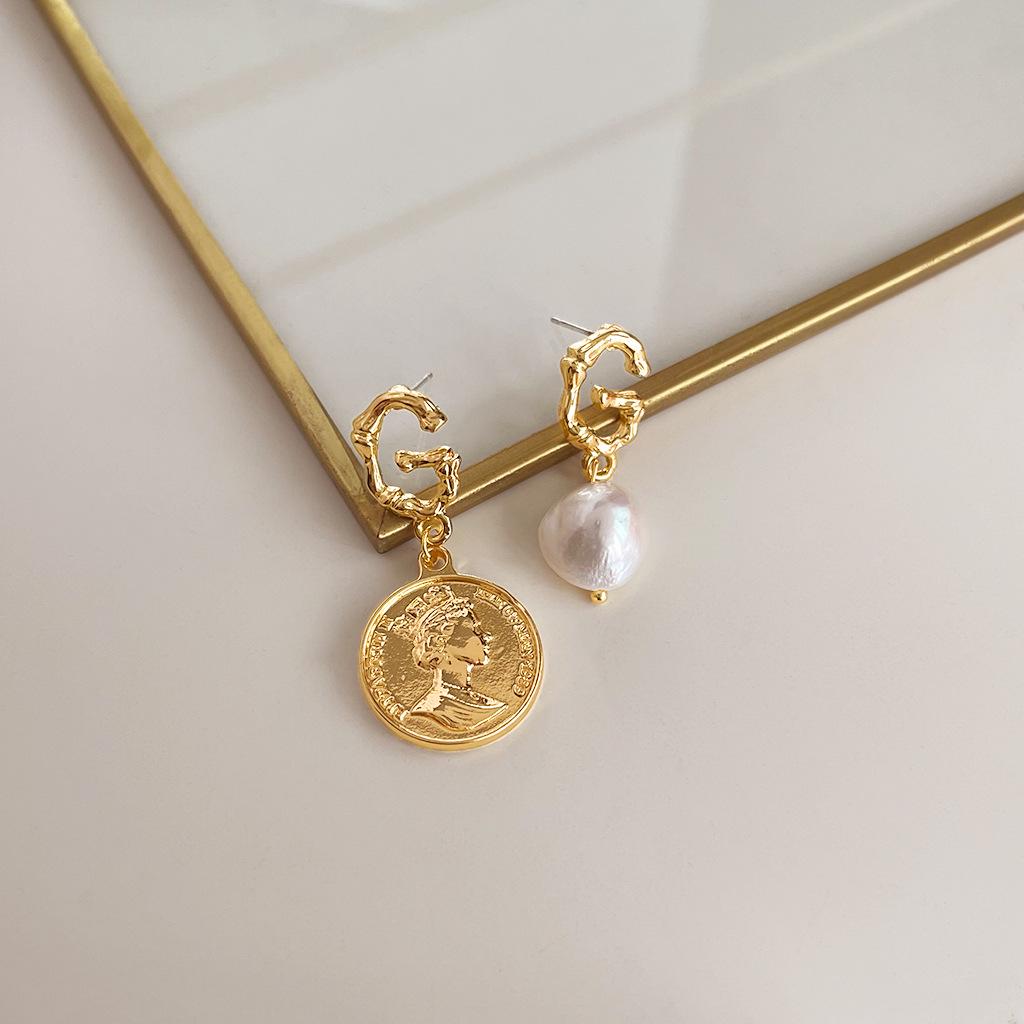 

Вінтажні середньовічні сережки-пусети з перлами: Дизайн у стилі ретро з ефектом крапель олії, з висококласним відтінком та унікальною особистістю