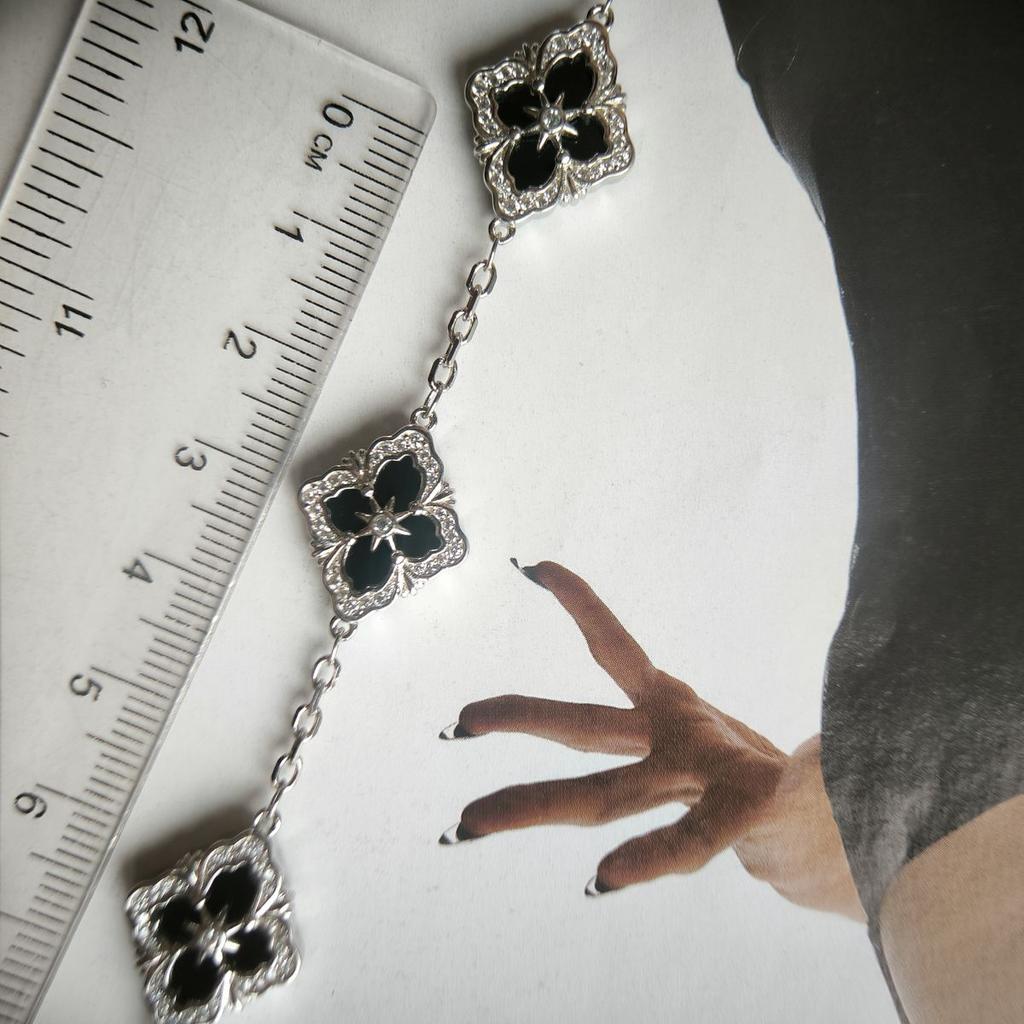 Серебряный браслет с натуральным ониксом, фианитами, вес изделия 11,36 гр (2177432)