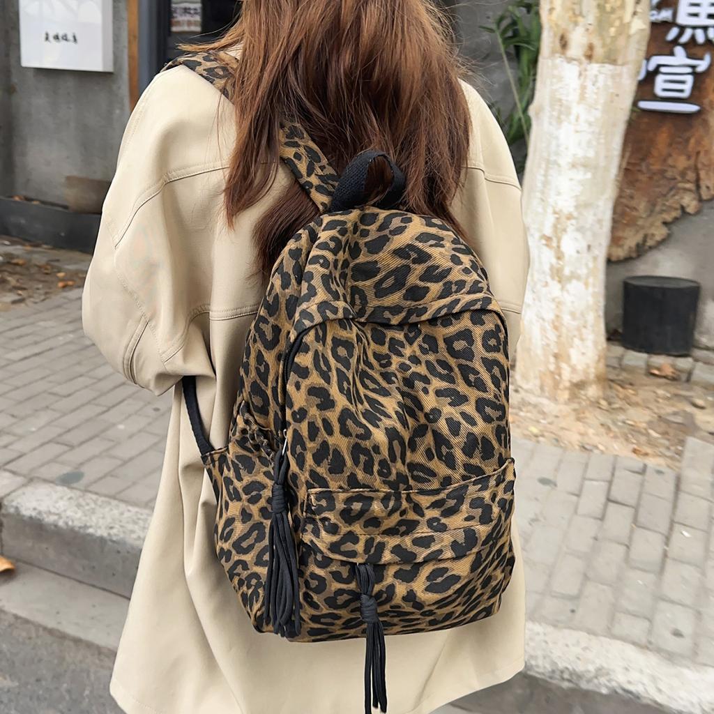 Leopard Print Backpack Casual Daily Use Trendy Street Style Lightweight Backpack for Women with Tassel Detail for School Travel and Everyday Outings