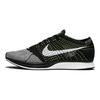 Кросівки Flyknit Racer Чорно-білі з вольтовим акцентом 526628-011