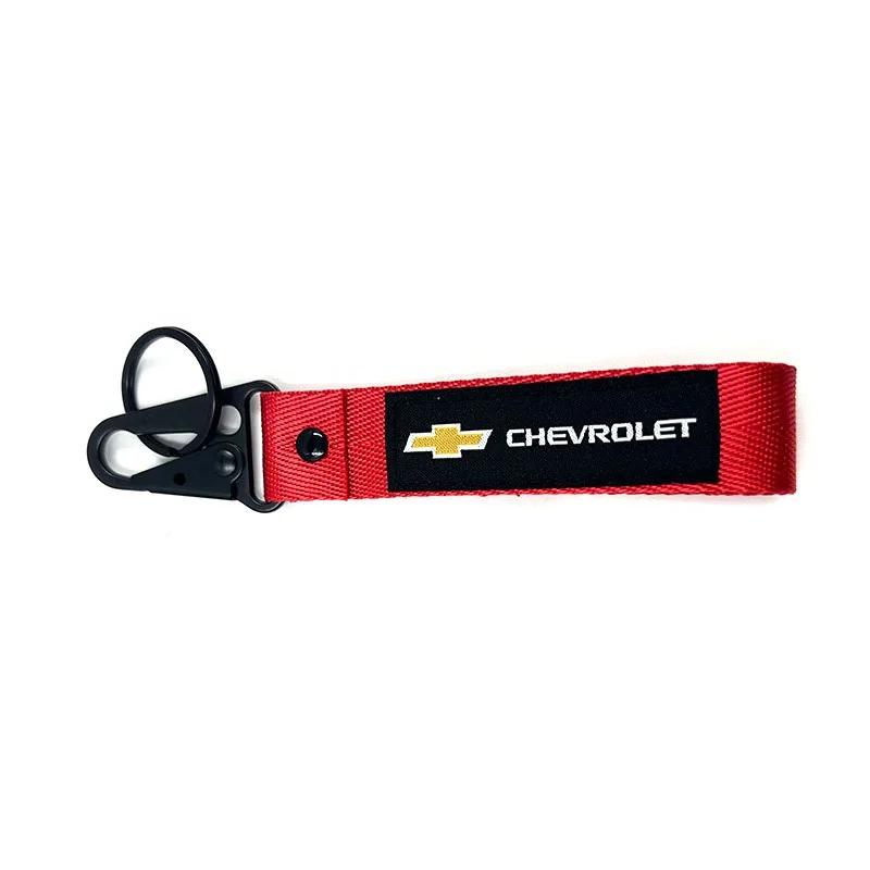 

Для Chevrolet CRUZE AVEO CAPTIVA COLORADO Corvette IMPALA LACETTI MALIBU Брелок с логотипом автомобиля Ремешок Нейлоновая стропа Держатель для брелоков красный