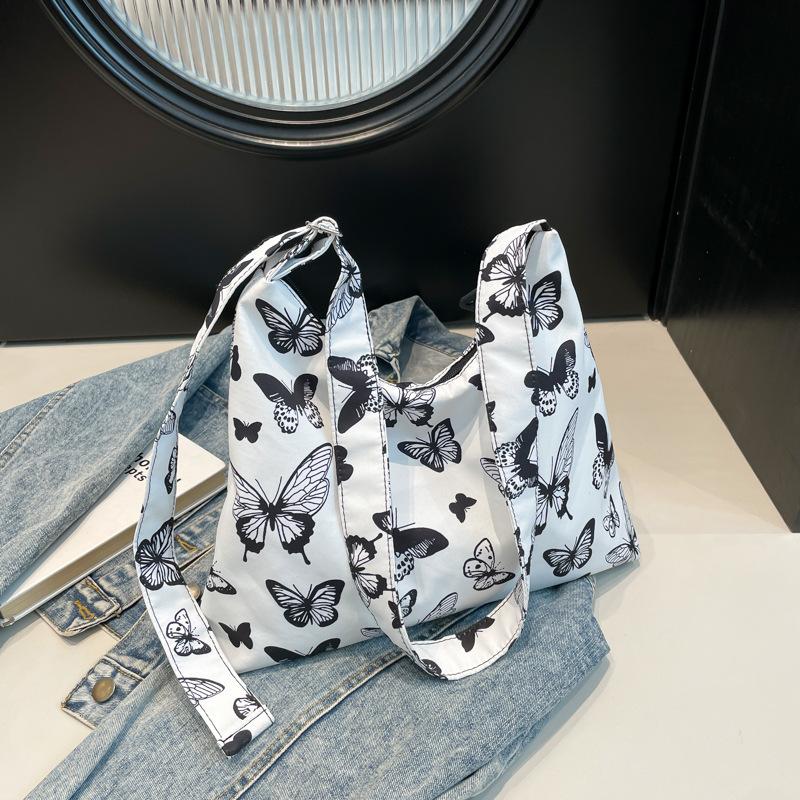 Literary polka dot crossbody women's bag small fresh floral girl shoulder bag underarm portable fashion large capacity tote bag