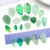 Set of 20 Green Transparent Faux Glass Leaf Pendants for DIY Bracelets, Necklaces, and Video Accessories.
