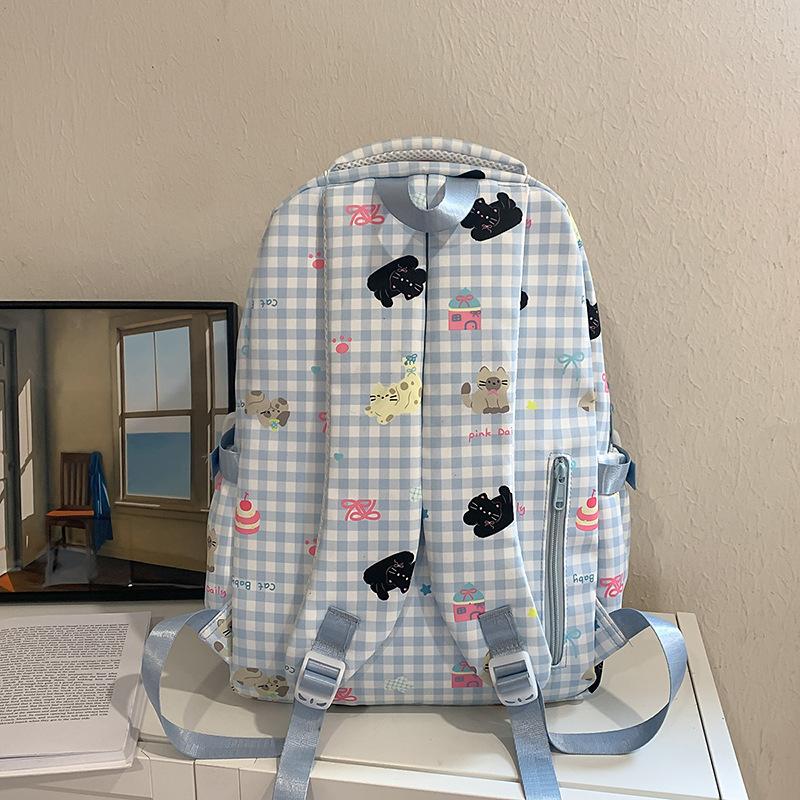 Schoolbag Japanese cute girl milk whirring mini backpack female Korean version dopamine plaid cartoon small bar pain bag