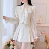 Elegant French Two-Piece Skirt Set: Bow Shirt & High-Waisted Short Skirt