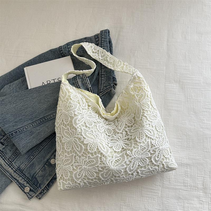 

Lace large-capacity high-value shoulder bag summer new niche design versatile going out leisure bag белый