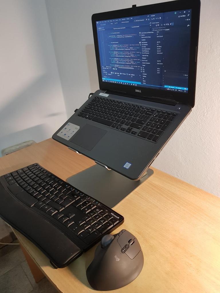 Adjustable Portable Laptop Stand with Rotating Heightening Cooling Feature