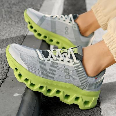 Zapatillas deportivas nacionales amortiguación zapatillas de running para maratón malla transpirable tejida voladora zapatillas de running Jinjiang