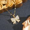 Korean Rhinestone Bow Necklace: Luxurious Zirconia Copper Pendant, Versatile Butterfly Clavicle Chain for Women