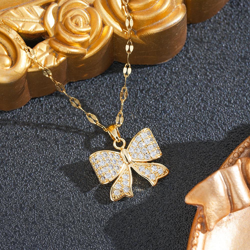 Korean Rhinestone Bow Necklace: Luxurious Zirconia Copper Pendant, Versatile Butterfly Clavicle Chain for Women