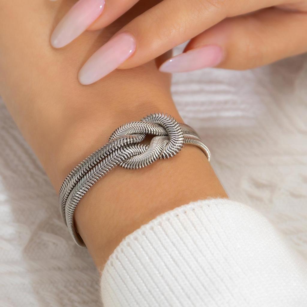 Wrap-around Snake Bone Chain Bracelet: European-American Minimalist Design with a Cold Style Knot and Buckle.