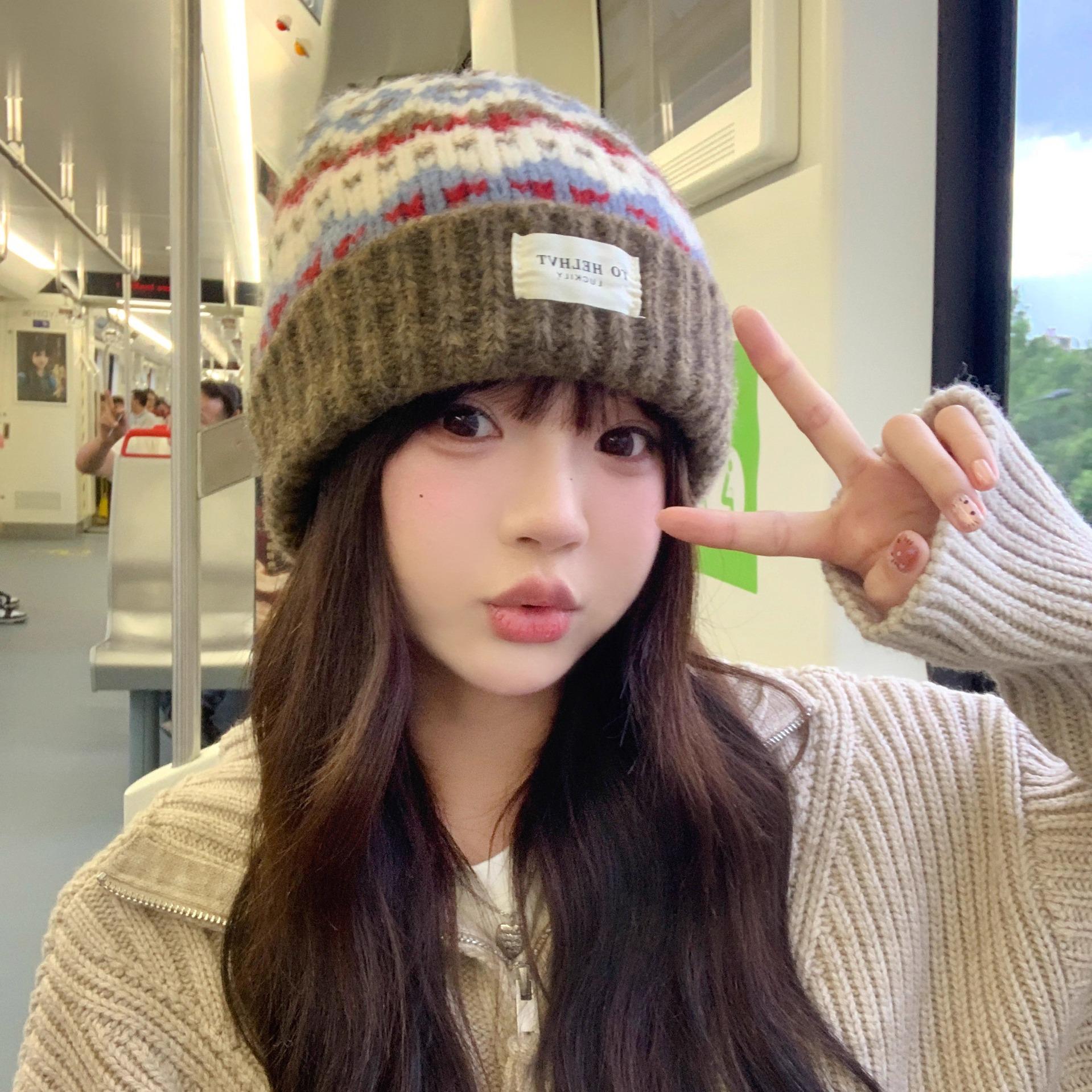 

Women s Retro Knitted Wool Beanie: Cozy Autumn/Winter Hat with Warm Ear Protection and Loose Fit.