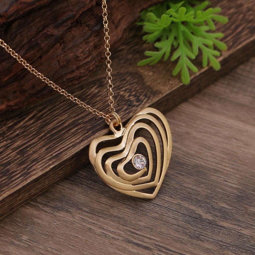 New geometric hollow brushed love pendant, women's fashion high sense diamond inlaid heart necklace