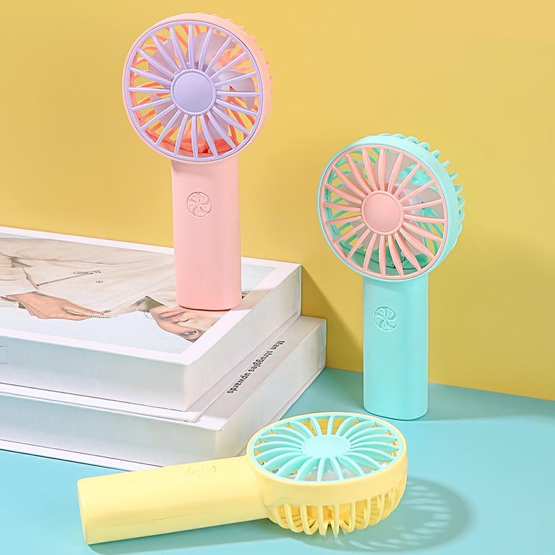 Tragbarer Taschenventilator für Studenten: Süß, Zweifarbig, Handheld, Wiederaufladbar, Vertikale Lagerung.