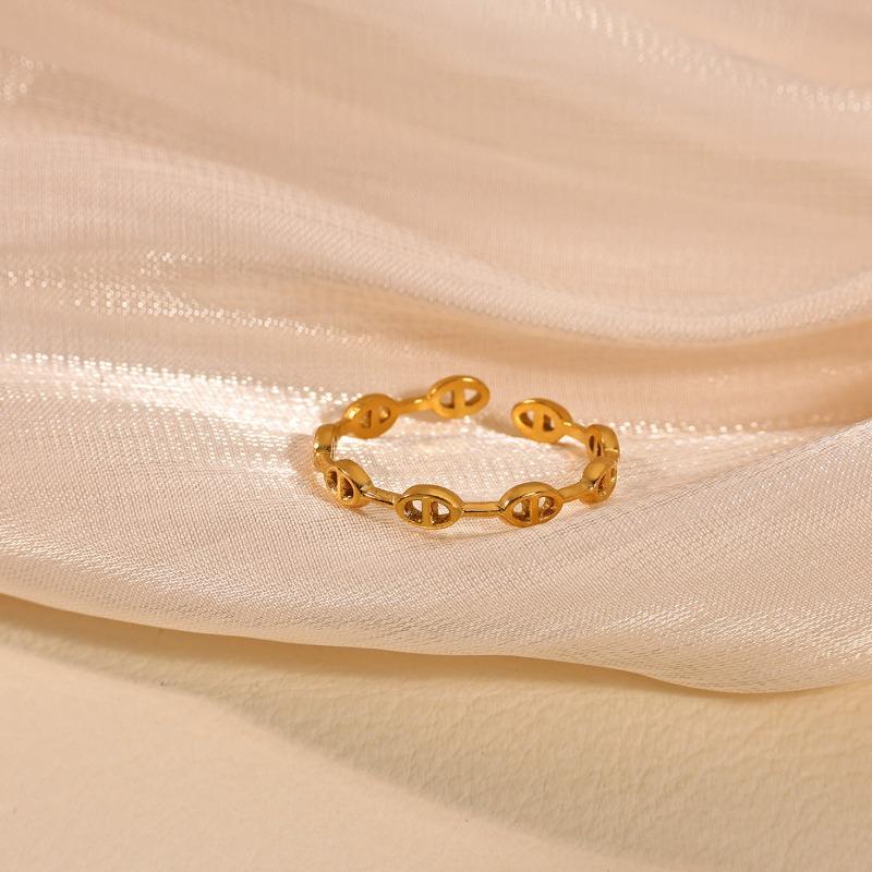 Gold-plated stainless steel hollow opening ring light luxury high-end design jewelry