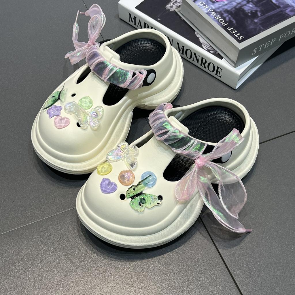 Fashion high-end hole shoes women's summer new outer wear runaway tired feet non-slip bag head slippers