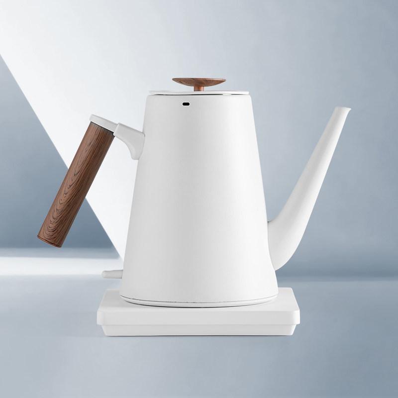 

Youmingtang Black & White Electric Kettle: Fast Boiling for Home, Tea Brewing, Water Heating, and Hotel Use.