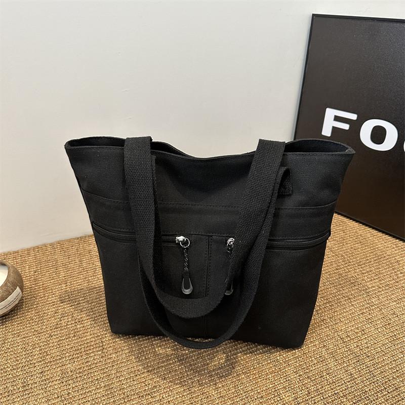Spacious And Stylish Black Canvas Tote Bag For Women Perfect For Casual Everyday Use