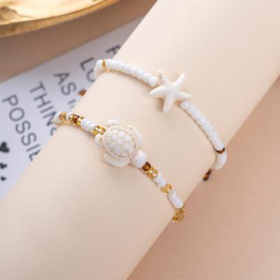 2 Stück Seestern- und Schildkröten-Designs Anhänger Schmuck Geschenk für Frauen Sommer Ozean Fußkettchen Halskette Taillenkette