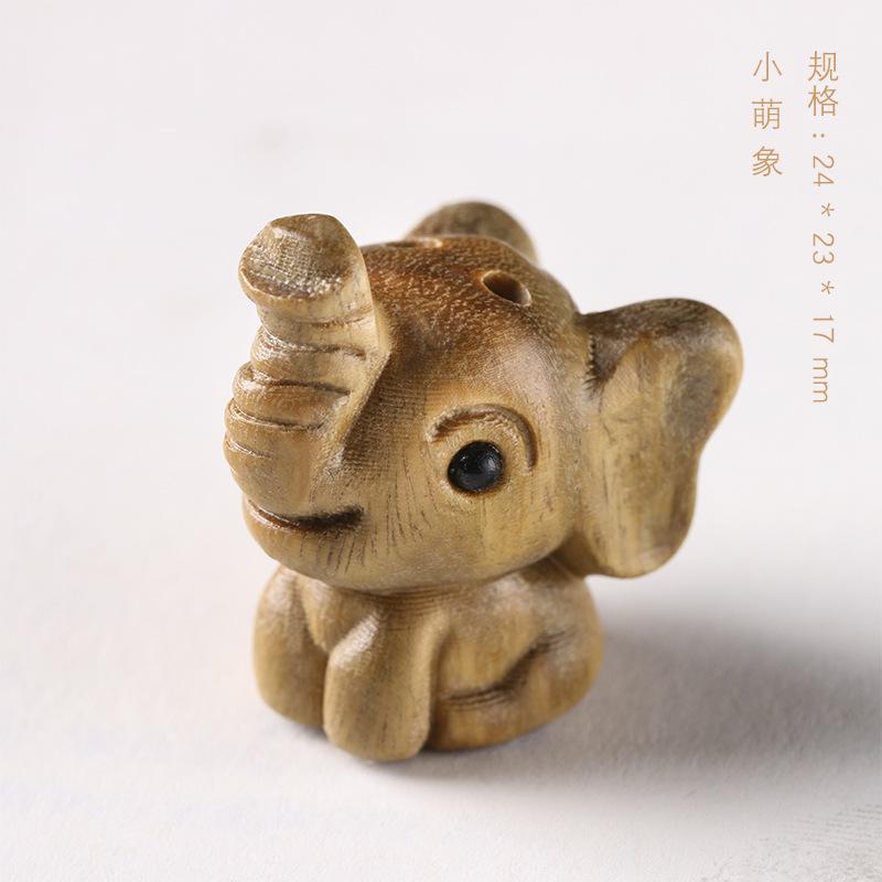 

Miniature Decoration figurines for interior Natural sandalwood DIY craft gift carving cute small elephant home decoration світло-сірого кольору