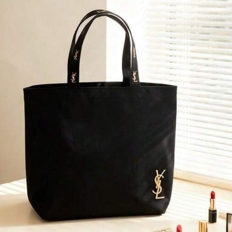 Schwarze Canvas-Umhängetasche von YSL, mit einem ultra-minimalistischen Design und großem Fassungsvermögen, geeignet für Arbeit, Shopping, Schule und Reisen.