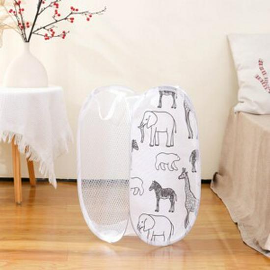 

Laundry Basket with Patterned Source Network: Cartoon Side Pocket Design for Clothes Storage and Organization.