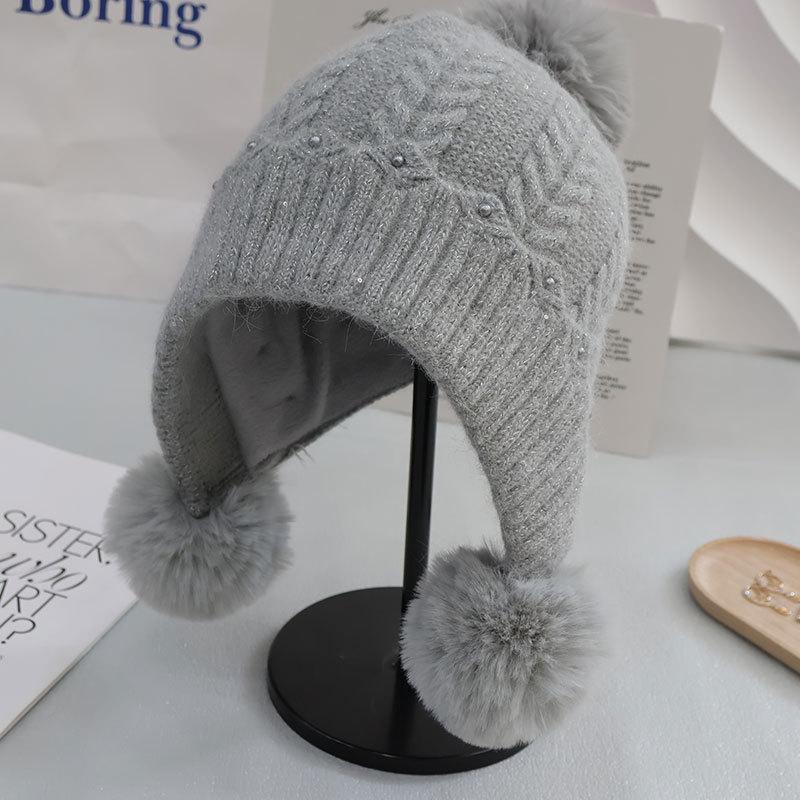 Fleece Kaninchenfell Gestrickte Thermomütze Damen Herbst und Winter Mode Pompon Ohrenschützer Wolle Pullovermütze