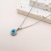 Squisito Set Collana e Orecchini in Acciaio di Titanio Placcato Oro con Design Occhio d'Angelo