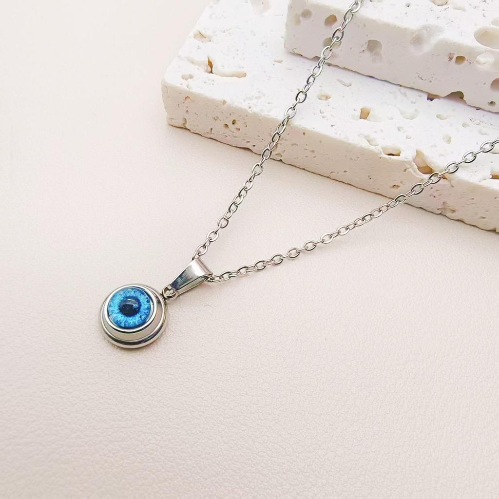 Squisito Set Collana e Orecchini in Acciaio di Titanio Placcato Oro con Design Occhio d'Angelo