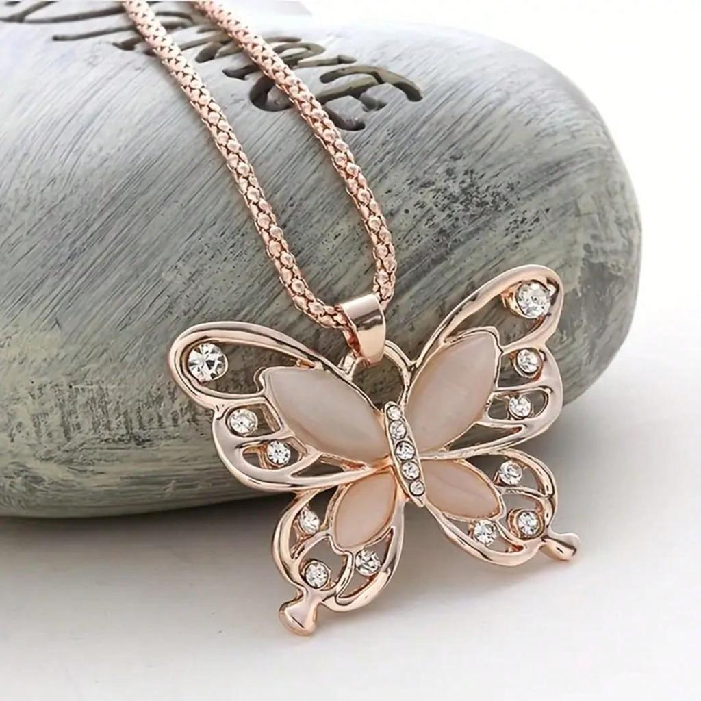 Stainless Steel Butterfly Pendant Necklace With A Rose Gold Faceplate, The Perfect Gift For Birthdays, Anniversaries, Or Casual Outfits.