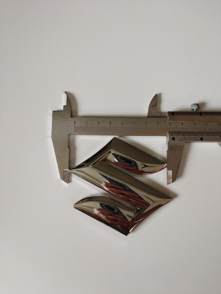 Suzuki S Logo Badge - Original Hollow Front Grille Emblem