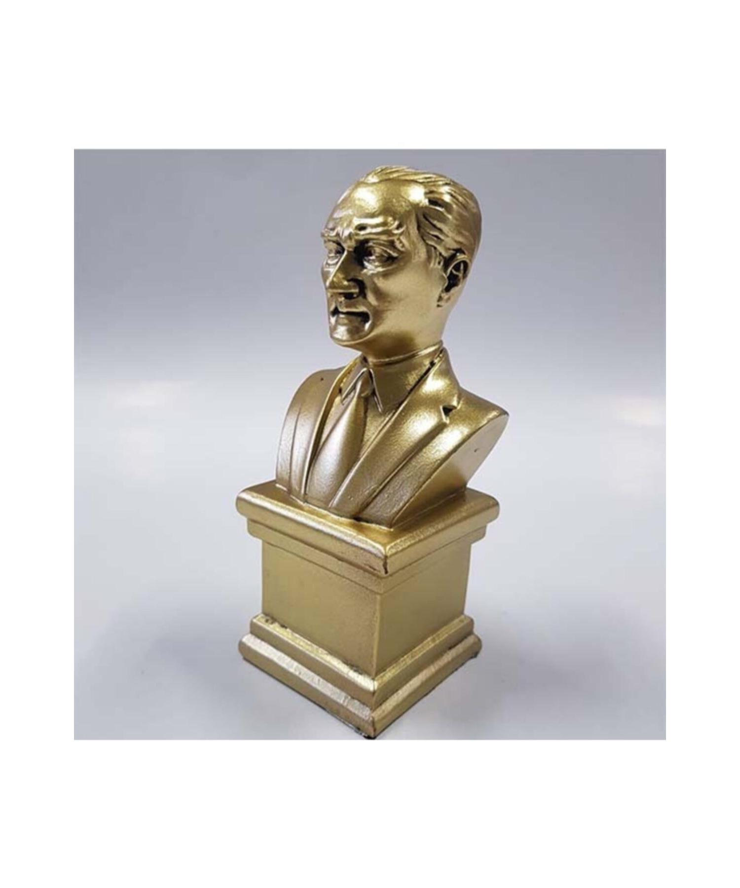 

Золотая безделушка с бюстом Ататюрка